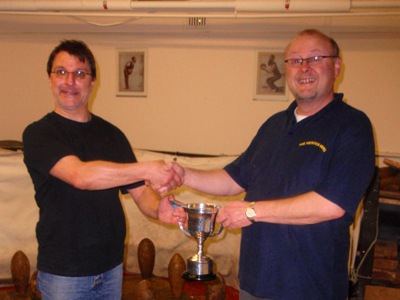 Tom Lederer (left) presents the Handicap Cup to Steve Barnes